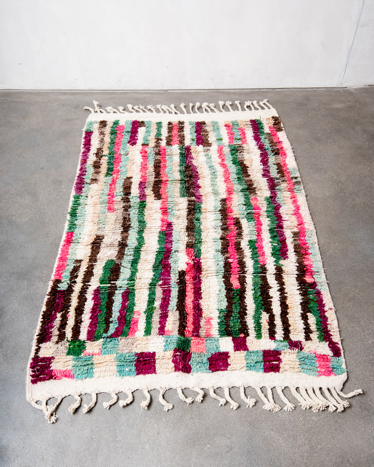 Modern, designer, handcrafted Berber rug from Morocco. Vintage carpet with beautiful colours and patterns and fluffy texture.